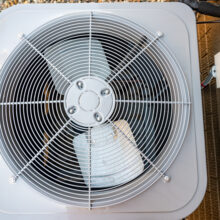 Top of an ac unit, looking down at the fan