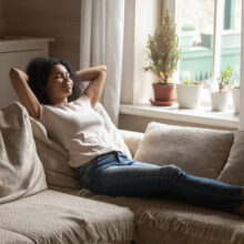Young woman breathing freely in her Asheville home