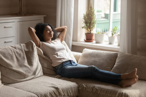 Young woman breathing freely in her Asheville home
